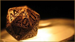 closeup D20 dice gold dungeons and dragons numbers macro