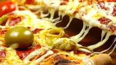 pizza cheese closeup olives