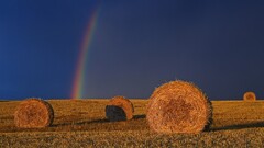 rainbows haystacks field sunlight