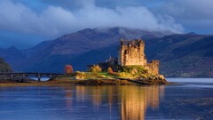 Scotland uk Eilean Donan castle Lake Mountains Bridge landscape