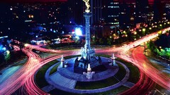town lights road long exposure building statue roundabouts