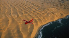 airplane Aircraft aerial view dunes desert landscape