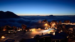 Alps overcast Mountains clouds village ski resort lights sky