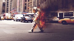 astronaut fire cityscape burning USA City street smoke helmet