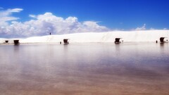 beach water outdoors clouds
