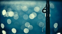 bokeh blue fishing rod