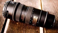 camera lens closeup Nikon wooden surface Technology numbers