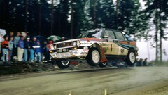 Car racing jumping vehicle front angle view Lancia Delta