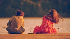 children sitting outdoors