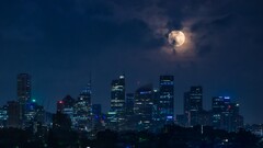 City cityscape skyline night moon lights Sydney Australia
