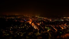 cityscape building blurred lights night