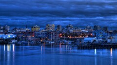 cityscape sky overcast ports boat water clouds lights
