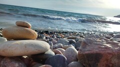 coast pebbles waves nature Sea