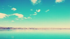 coast sky water clouds