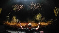 crowds arms up fireworks Men DJ