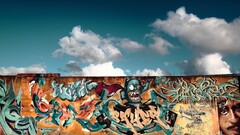 digital art graffiti wall sky face clouds