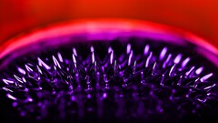 ferrofluid macro bokeh purple red
