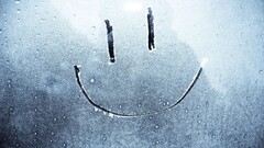 glass smiley eyes mouths snow water drops