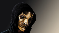 gold yellow artwork mystique face white black Danny mask