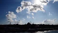 Istanbul dark cityscape sunlight water sky