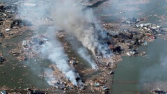 Japan earthquakes smoke tsunami