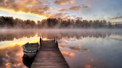 Lake pier mist boat planks calm calm waters nature idyllic