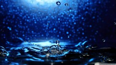 liquid water water drops blue blue background