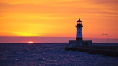 minnesota lighthouse Lake sunset orange sky