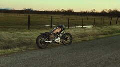 motorcycle field road bobber vehicle fence