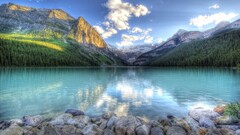 Mountains Trees stones water lake louise banff national park