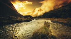nature river sunset grass clouds landscape stones sunlight