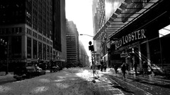 new york city monochrome snow street cityscape sunbeams building
