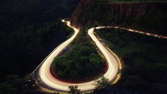 road forest hairpin turns long exposure landscape