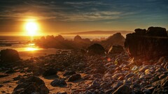 rock coast sunset beach landscape sunlight