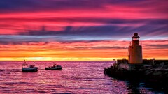 Sea sky boat lighthouse clouds horizon sunset red