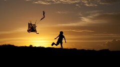 silhouette children sunlight dark sky outdoors