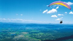 sky skydiver clouds landscape