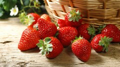 strawberries baskets fruit wooden surface