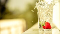 strawberries drinking glass water