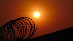 sun sunlight silhouette wall barbed wire