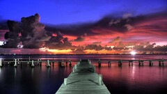 sunset dock clouds sky