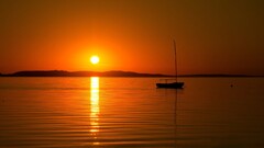 sunset silhouette Sea golden hour reflection sunlight Sailboats