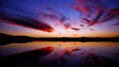 sunset sky water dark reflection clouds