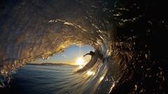 sunset surfers waves surfing water sun reflection Sport