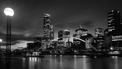 town lights black white water river reflection Australia night