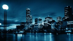 town lights blue water river reflection Melbourne cityscape cyan