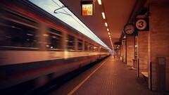 train blurred train station vehicle long exposure clocks