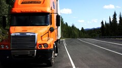 trucks Freightliner vehicle road pine trees asphalt orange