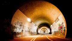 tunnel graffiti Bricks street lights arrows urban road