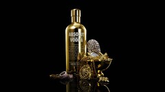vodka absolut Jewelry black background rings gold bottles